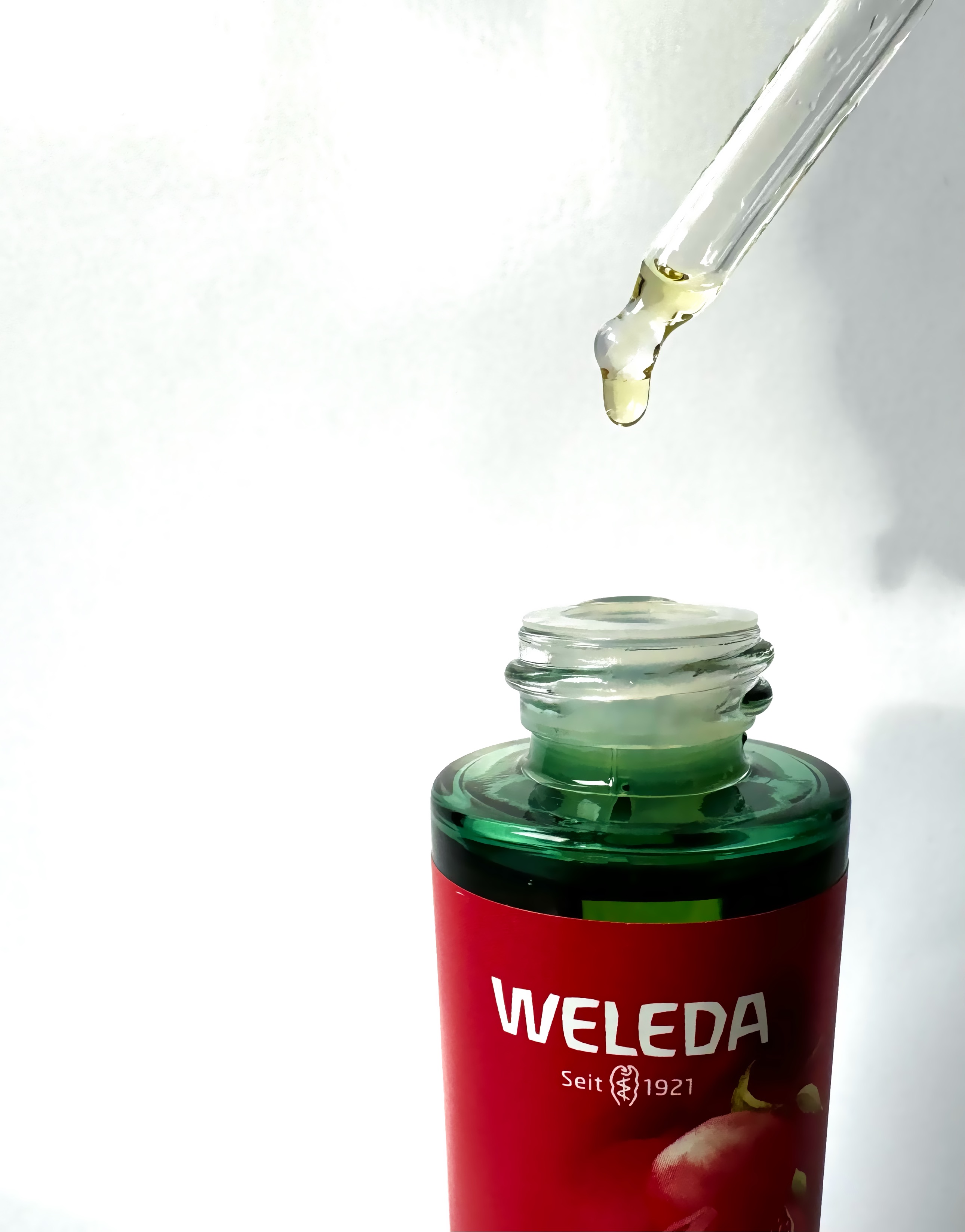 Гранатова олія-бустер для обличчя Weleda Firming Facial Oil