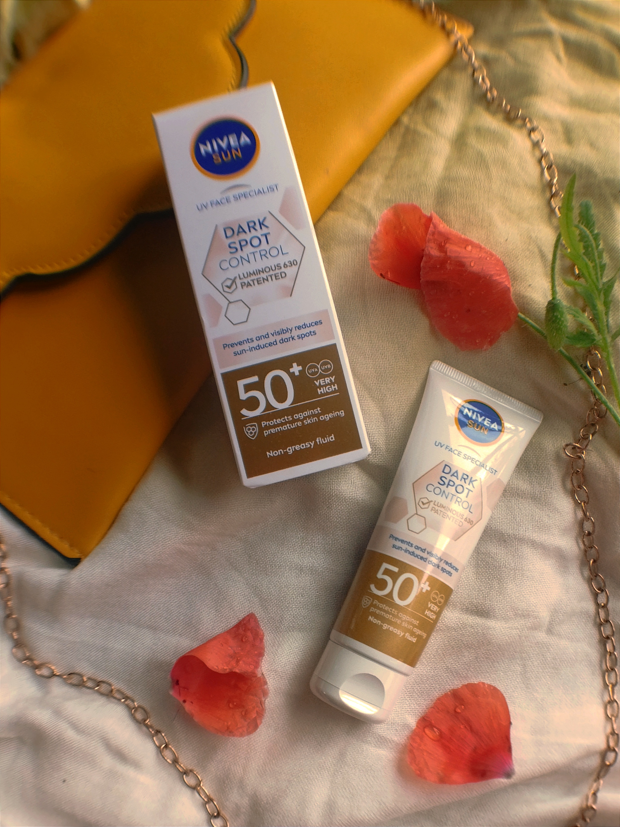 Сонцезахисний крем-флюїд для обличчя "Контроль пігментації" SPF 50