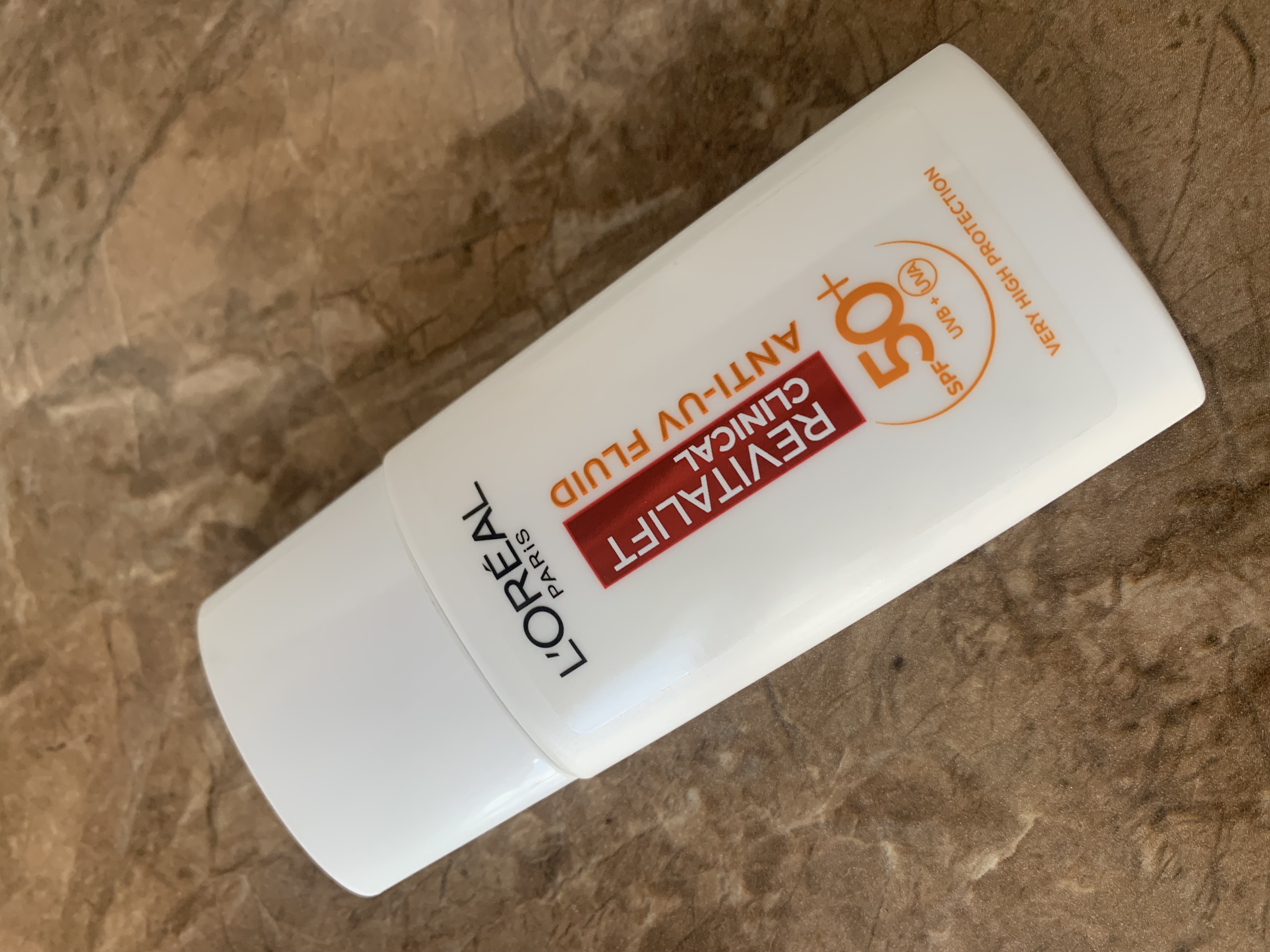 SPF 50+ СОНЦЕЗАХИСНИЙ ФЛЮЇД  від LOREAL Anti-UV REVITALIFT CLINICAL