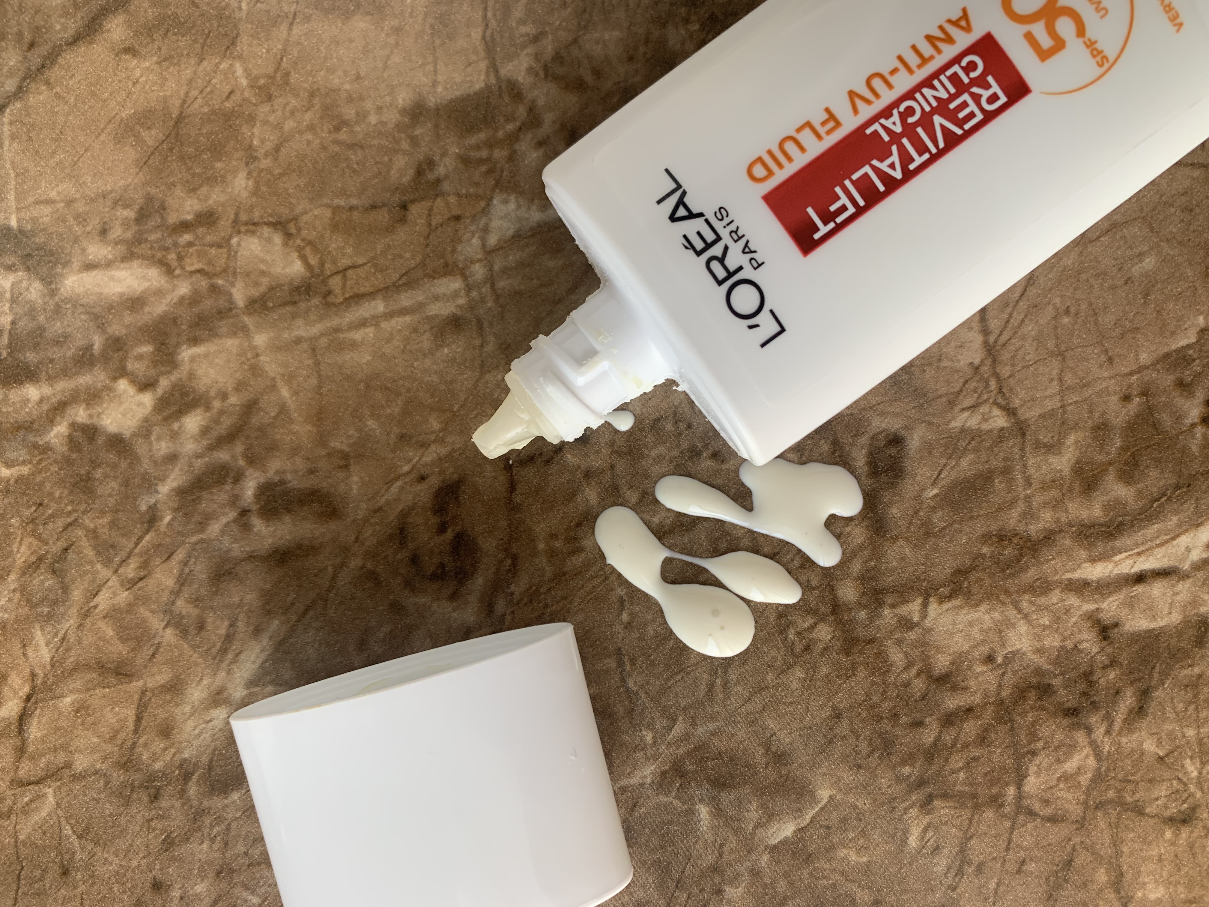 SPF 50+ СОНЦЕЗАХИСНИЙ ФЛЮЇД  від LOREAL Anti-UV REVITALIFT CLINICAL